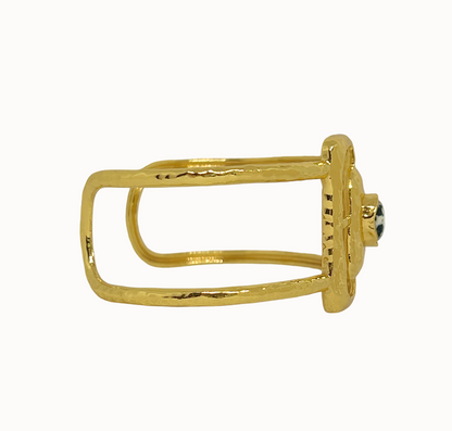 Astrid Gold Cuff - Mountain & Moon 

Description

Astrid commands attention without asking for it. A wide hammered gold cuff with an open rectangular frame at its centre, set with a Dalmatian Jasper stone - architectural, organic, and unmistakably considered.

A statement piece from the Odyssey collection - for the woman who adorns herself with meaning, not just habit.

Micron 18K gold & sterling silver plating 
to premium jewellery standards