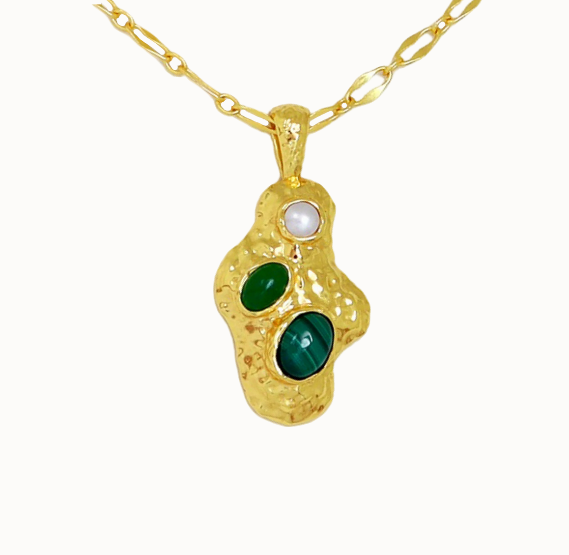 Federica Necklace Gold

Description
GOLDEN LAYERS • FUTURE KEEPSAKE
Softly sculptural and rich with meaning, Federica is designed to feel like something discovered - not just worn. A vintage-inspired chain leads to an organic, freeform pendant set with Green Jade, Malachite, and Freshwater Pearl, creating a piece that feels both grounded and elevated.