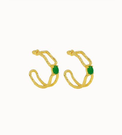 Sascha Earrings Gold - Mountain & Moon 

Description

ELEVATED ESSENTIALS • WEAR ON REPEAT

The Sascha Earrings bring sculptural sophistication to your everyday rotation. 
An organic, open double-hoop silhouette, anchored by a vibrant Green Jade gemstone at its center - an unexpected focal point that feels both grounded and playful. Softly textured gold catches the light, adding dimension and a subtle vintage inspired edge. 