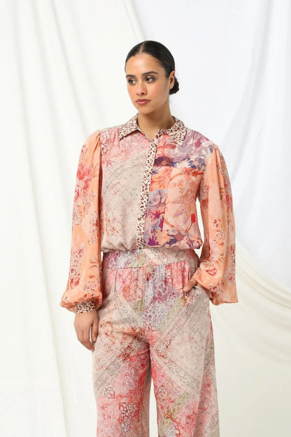 the kachel selena pant in pink is a stylish wide-leg pant in a viscose fabric in a beaituful patchwork print in warm feminine tones
