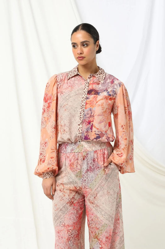 the kachel selena pant in pink is a stylish wide-leg pant in a viscose fabric in a beaituful patchwork print in warm feminine tones