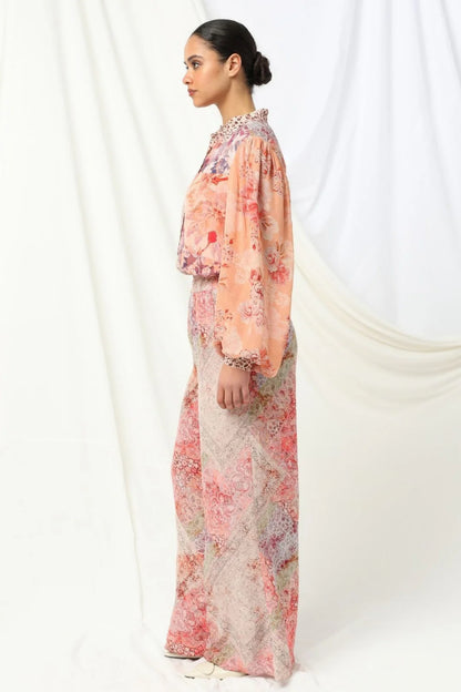 the kachel selena pant in pink is a stylish wide-leg pant in a viscose fabric in a beaituful patchwork print in warm feminine tones