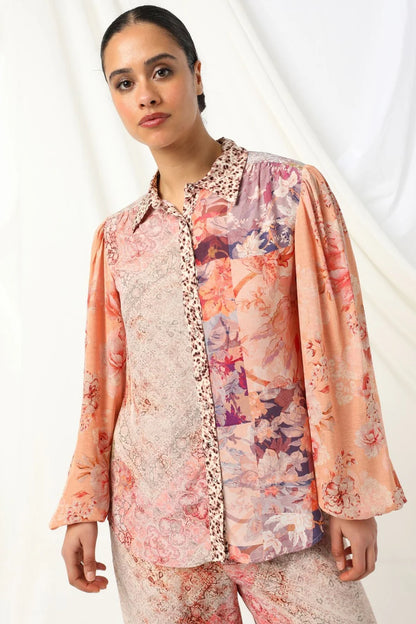the kachel lorelai shirt feautres a floral print with soft animal print tones in soft pink with a feminine touch.