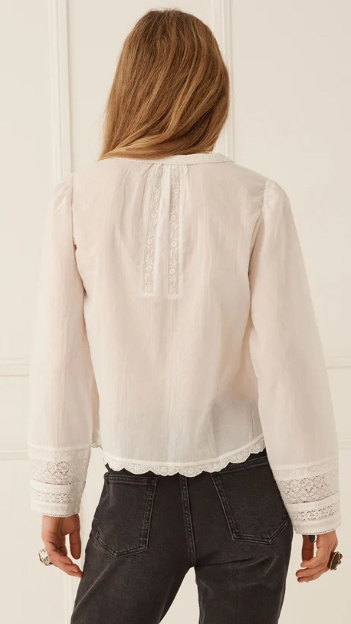 The Prairie Long Sleeve Blouse in Antique White by SPELL, exudes effortless romance with a beautifully artisanal, vintage-inspired spirit. Timeless with a modern twist, this feminine silhouette celebrates intricate lace detailing and the charm of considered craftsmanship.