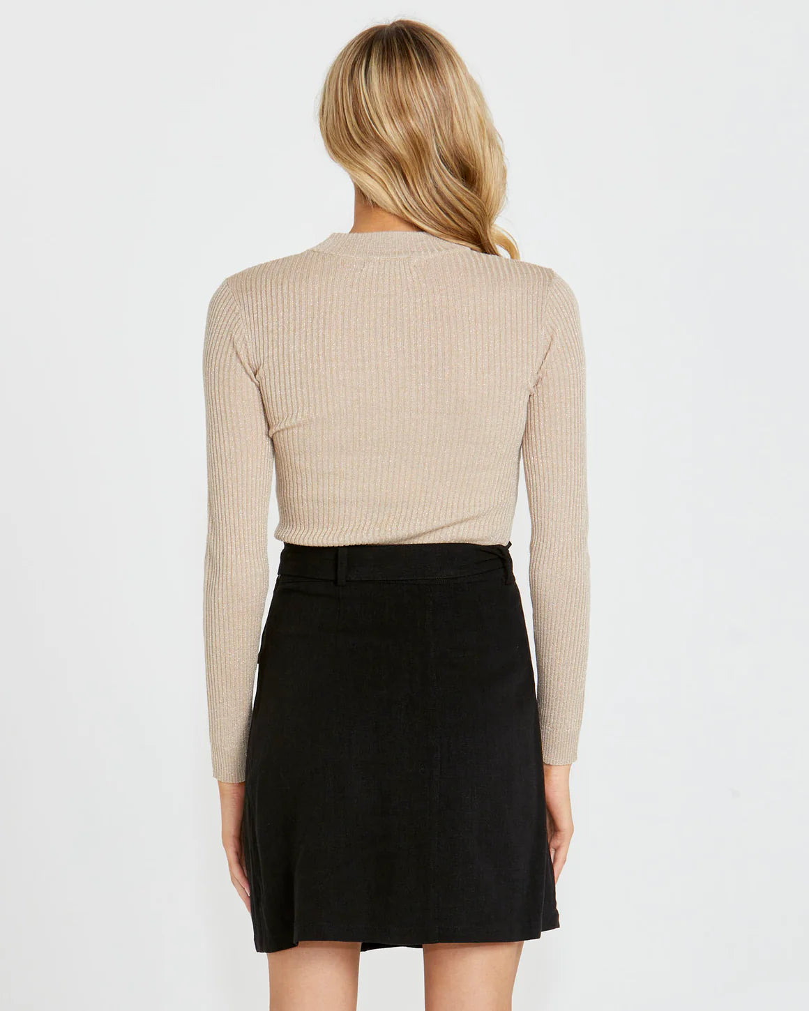 Shimmer, shine, and steal the spotlight. This is your disco moment.

The Madeline Lurex Knit Top by Sass Clothing brings instant retro energy to your wardrobe, blending vintage-inspired glamour with a modern, wearable edge. Designed with a slim, body-skimming fit and a chic low turtle neck, it channels those iconic disco-era vibes while still feeling fresh and effortless for today.