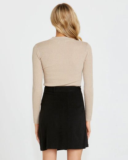 Shimmer, shine, and steal the spotlight. This is your disco moment.

The Madeline Lurex Knit Top by Sass Clothing brings instant retro energy to your wardrobe, blending vintage-inspired glamour with a modern, wearable edge. Designed with a slim, body-skimming fit and a chic low turtle neck, it channels those iconic disco-era vibes while still feeling fresh and effortless for today.
