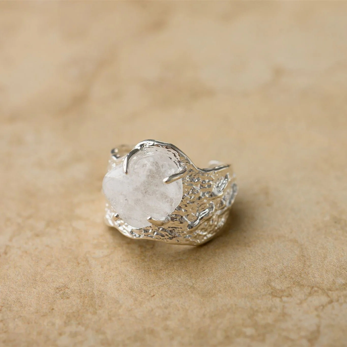 The NOHEA ring features a lavish crushed silver design that adds luxury to any outfit. This ring is perfect for elevating your style and adding a touch of glamour to your wardrobe.

S925 Sterling Silver
Crushed Silver/Clear Semi Precious Gemstones
Lead,Nickel &amp; Tarnish Free
Hypoallergenic
Adjustable to fit all sizes