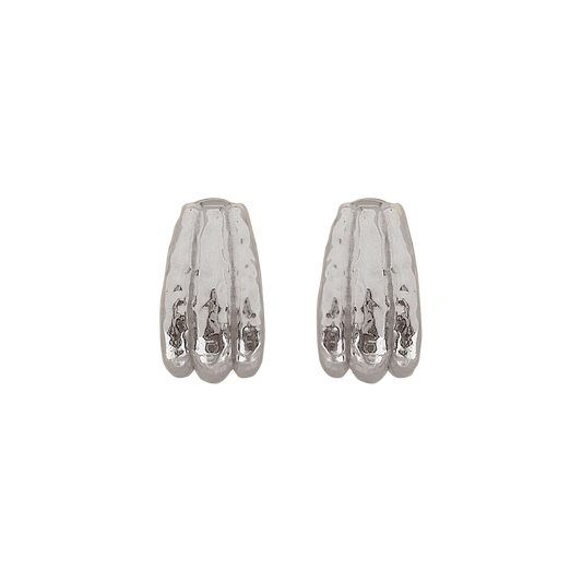 Okay let’s talk about the Jones Earring! Oh so fabulous and effortlessly chic. A silver chunky huggie style that hugs the ear with finesse and features our signature hammered texturing. The Jones is a classic shape and perfectly flows from day to night, paired with your favourite tee and denim, a suit set or summer florals, understated yet bold, she is versatile to say the least. Inspired by the power woman who can do it all. The Jones Earrings will have you feeling exactly that way… 
