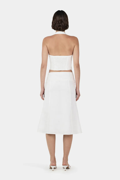 Effortless Elegance with the Lee Lee Linen Top

Step into easy-breezy sophistication with Ownley’s Lee Lee Linen Top. Designed with a flattering corset-style bodice and princess seams, this top shapes and accentuates your silhouette while keeping things effortlessly chic. Wide straps sweep into a halter neck, and a shirring panel at the back ensures comfort and a perfect fit.