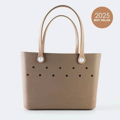 Just Right for the Everyday - Holds your laptop, lunch, drink bottle and book, the perfect on-the-go size.