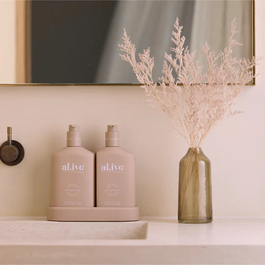 al.ive body - A 500ml Hand &amp; Body Wash and 500ml Hand &amp; Body Lotion housed in interlocking bottles that sit neatly within a matching tray. Presented in the Nude colourway in our sweet Apricot &amp; Sweet Fig scent, a warm blend of ripe fruit and vanilla.