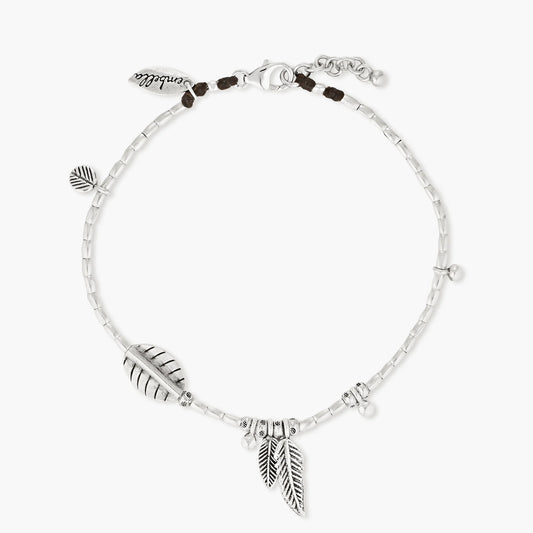 Crafted with solid Hill Tribe Silver beads and pendants, the Ocean Feathers Anklet is built to last. Strung on durable polywax cotton and secured with a sterling silver parrot clasp, this bracelet combines strength with timeless ocean-inspired style. We love the many handmade charms this anklet features, including our signature ocean bubble bead.