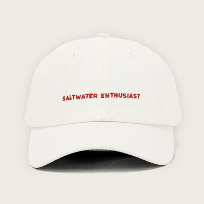 Pallion Point - Introducing our new Lifestyle Lids, a fish-free celebration of Australia's love for the ocean. The Saltwater Enthusiast Lid is made for those who live in wet togs and thrive on salty hair, sandy feet, and sun-drenched weekends. Featuring bold red text on a classic cream, this soft cotton dad cap is minimal and unmistakably Aussie - designed for everyone who feels most at home near the water