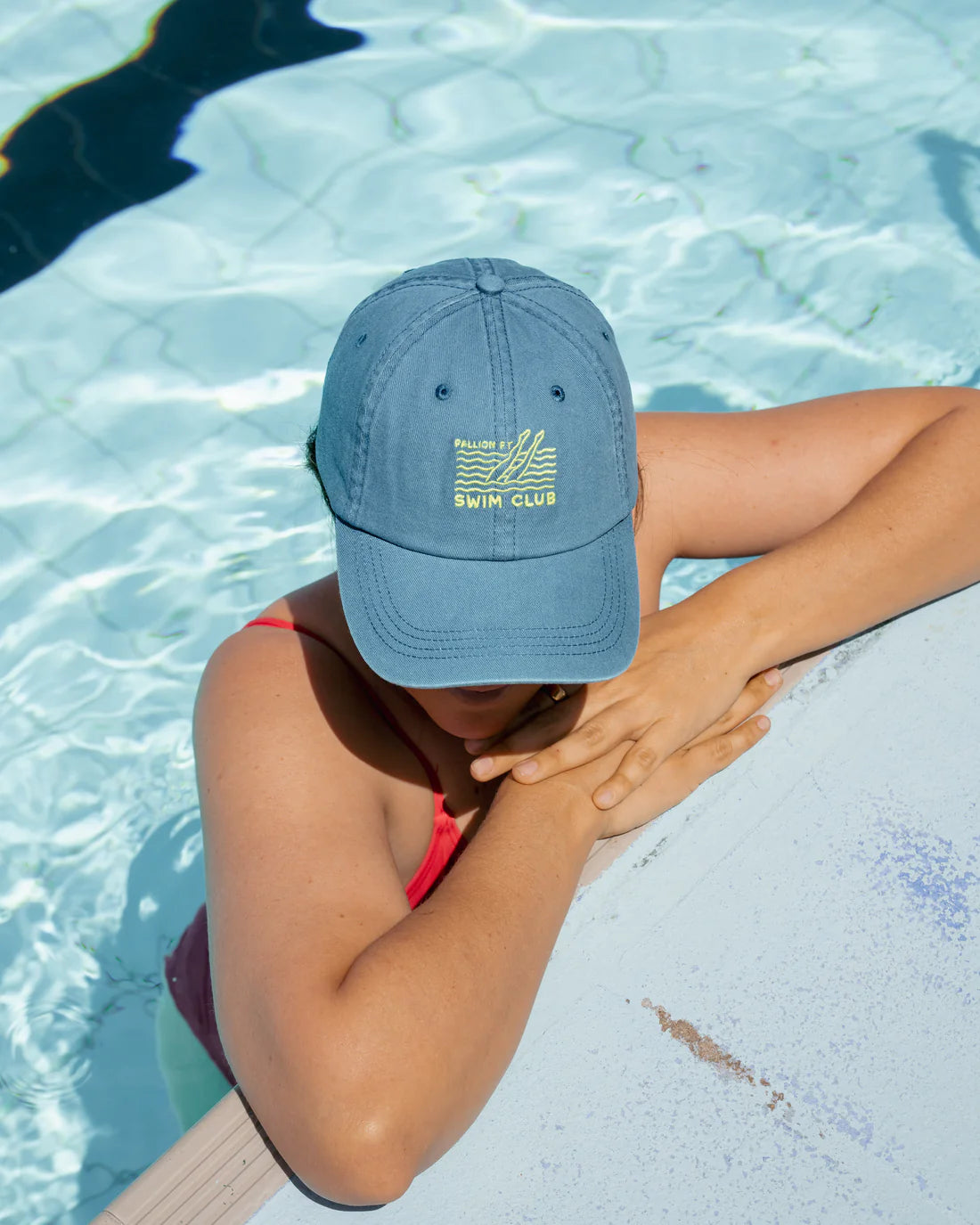 Pallion Point - Introducing our new Lifestyle Lids, a fish-free celebration of Australia's love for the ocean. The Swim Club Lid is inspired by early mornings at your local ocean pool - towel over the shoulder, goggles in hand. Crafted from soft cotton with a washed blue tone, this hat is your new staple for post-swim chats on sun-warmed steps.&nbsp;Made for anyone who believes a morning dip can fix just about anything. For those who dive in, come up smiling, and start the day salty.&nbsp;