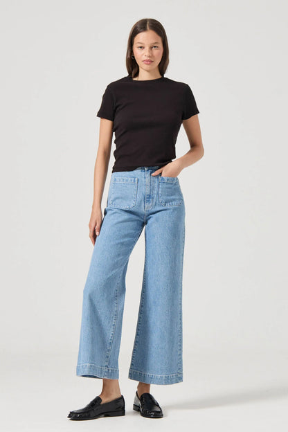 The Sailor Jean:
High rise, slim fit with a sailor wide leg
Fits smaller in the waist to eliminate gaps at the back waistband
Features Rolla's signature back pockets &amp; sailor style patch front pockets
Specially angled and shaped in the back for a truly peachy looking butt
Ankle length, also available in a long length
Zip closure
Made with vintage gold toned hardware