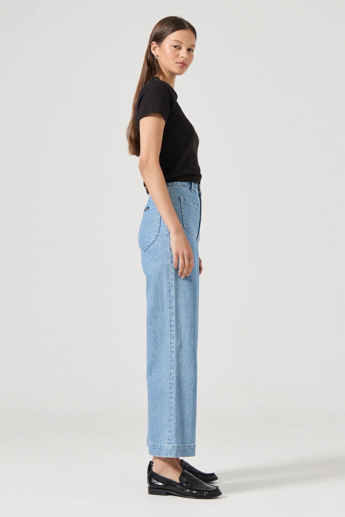 The Sailor Jean:
High rise, slim fit with a sailor wide leg
Fits smaller in the waist to eliminate gaps at the back waistband
Features Rolla's signature back pockets &amp; sailor style patch front pockets
Specially angled and shaped in the back for a truly peachy looking butt
Ankle length, also available in a long length
Zip closure
Made with vintage gold toned hardware