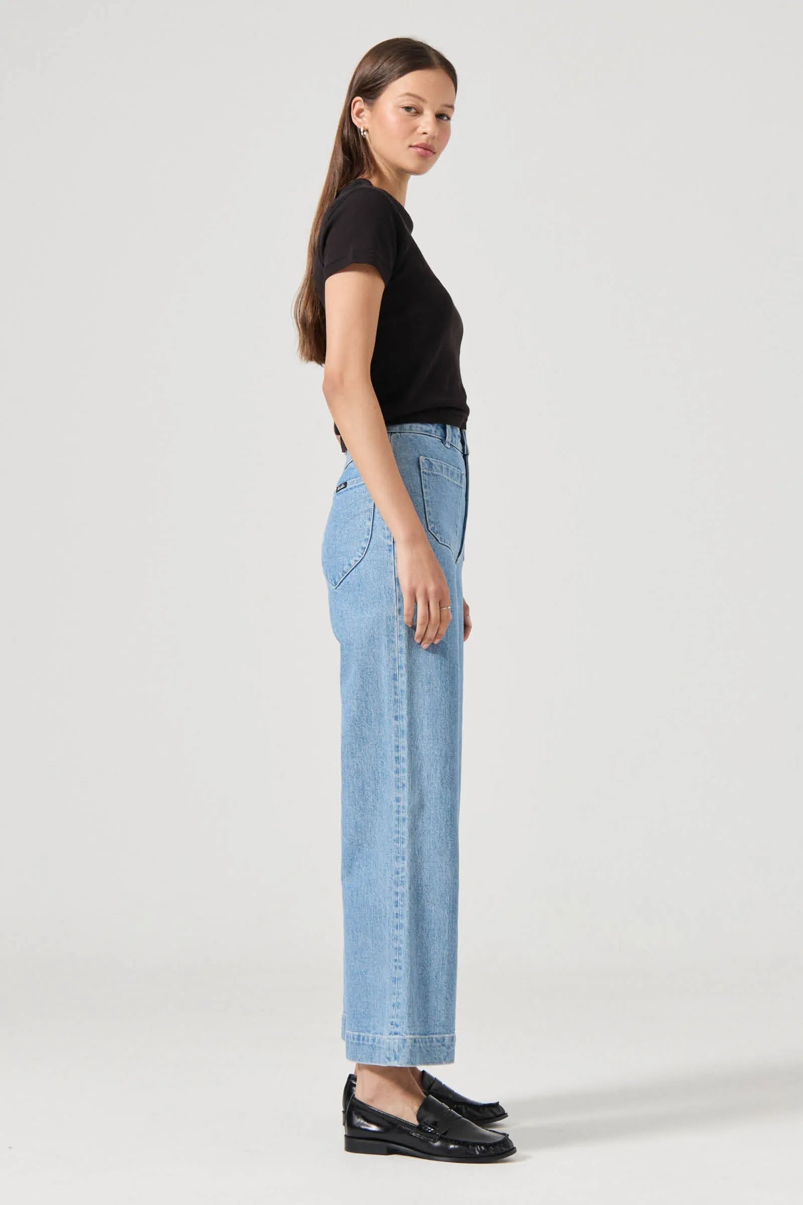 The Sailor Jean:
High rise, slim fit with a sailor wide leg
Fits smaller in the waist to eliminate gaps at the back waistband
Features Rolla's signature back pockets &amp; sailor style patch front pockets
Specially angled and shaped in the back for a truly peachy looking butt
Ankle length, also available in a long length
Zip closure
Made with vintage gold toned hardware