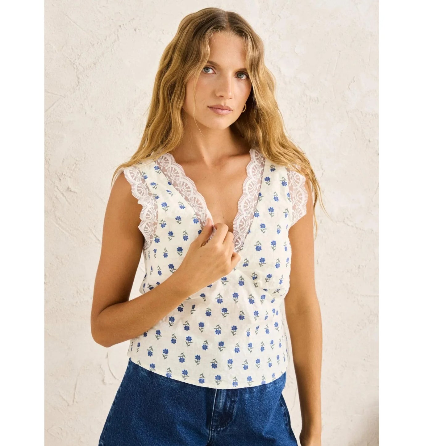 Flirty, Feminine, and Effortlessly Chic

Meet the Rhythm Primrose Lace Top, your new wardrobe favourite for easy, elevated style. Soft floral prints meet delicate lace trims for a subtly romantic finish, while the V-neckline and cropped silhouette make it perfect for pairing with high-waisted jeans, breezy skirts, or tailored trousers. Lightweight and breathable, it moves with you all day, giving comfort without ever compromising on style.