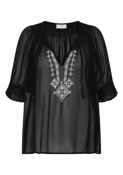 Romantic, floaty, and just a little bit vintage, this is the blouse that does it all.

Meet your new go-to blouse for effortless romance and vintage charm. The Stevie Embroidered Blouse by Auguste The Label in black is crafted from softly draped viscose georgette, giving it a semi-sheer, fluid finish that moves beautifully with you. The flattering V-neckline with an optional tie adds a touch of versatility, while delicate shirring around the neckline creates subtle texture that feels both refined and relaxe