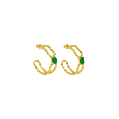 The Sascha Earrings bring sculptural sophistication to your everyday rotation.
An organic,open double-hoop silhouette, anchored by a vibrant Green Jade gemstone at its center - an unexpected focal point that feels both grounded and playful. Softly textured gold catches the light, adding dimension and a subtle vintage-inspired edge.