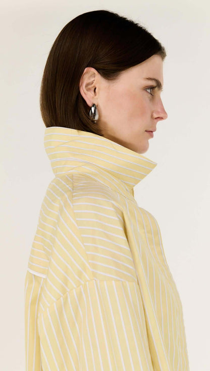 Sunshine in a Shirt.

Meet the Zeno Butter Yellow Striped Shirt from Staple The Label, your new go-to for effortless, everyday polish with zero fuss. Lightweight, breezy, and oh-so-soft, this relaxed-fit shirt drapes beautifully, giving you that put-together vibe while keeping things easy and comfortable.

With subtle yellow-and-white stripes and a classic button-through front, it’s the kind of shirt you can wear loose, half-tucked, or layered for a fresh, modern take on warm-weather dressing. Pair it with 