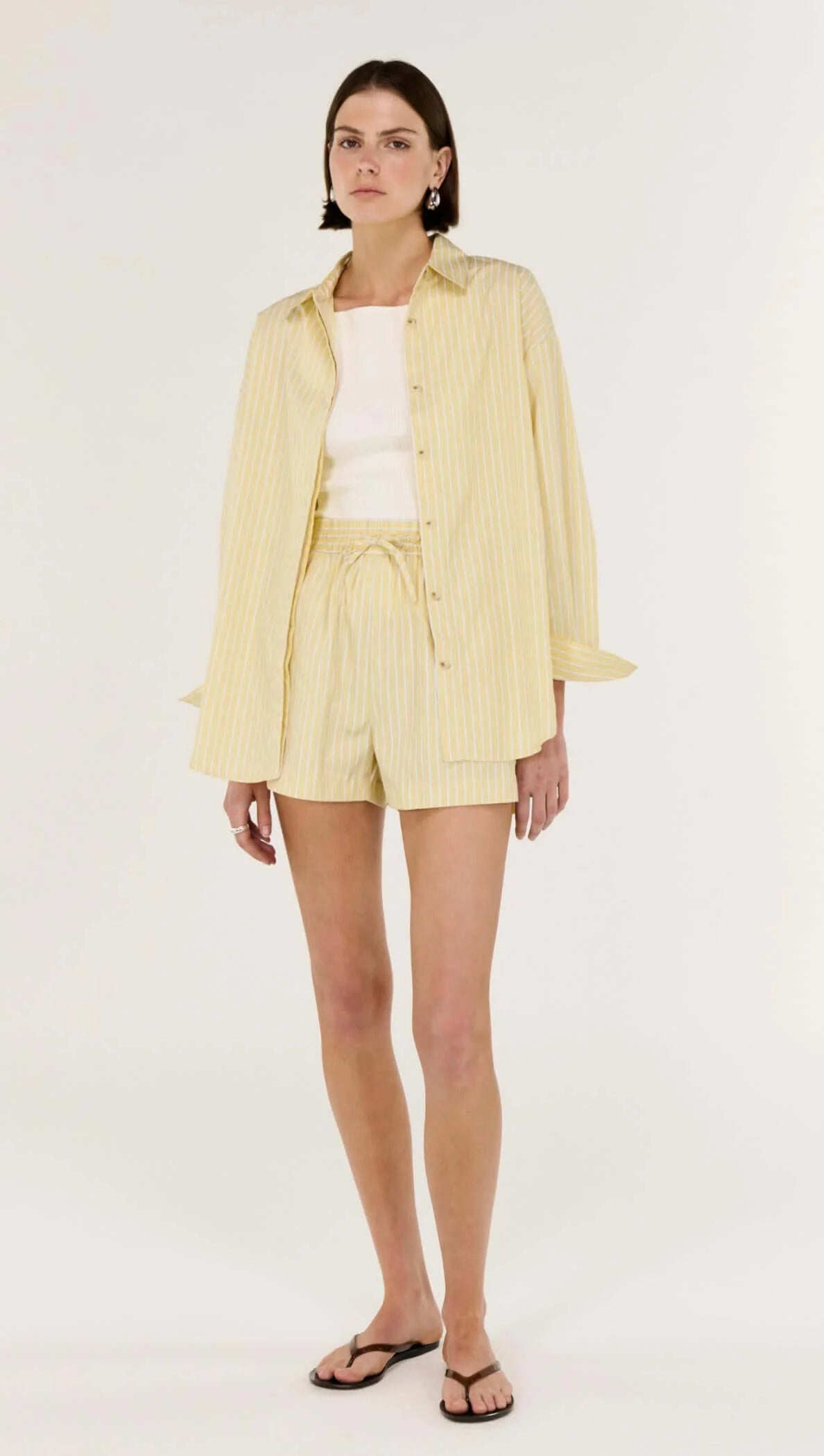 Sunshine in a Shirt.

Meet the Zeno Butter Yellow Striped Shirt from Staple The Label, your new go-to for effortless, everyday polish with zero fuss. Lightweight, breezy, and oh-so-soft, this relaxed-fit shirt drapes beautifully, giving you that put-together vibe while keeping things easy and comfortable.

With subtle yellow-and-white stripes and a classic button-through front, it’s the kind of shirt you can wear loose, half-tucked, or layered for a fresh, modern take on warm-weather dressing. Pair it with 