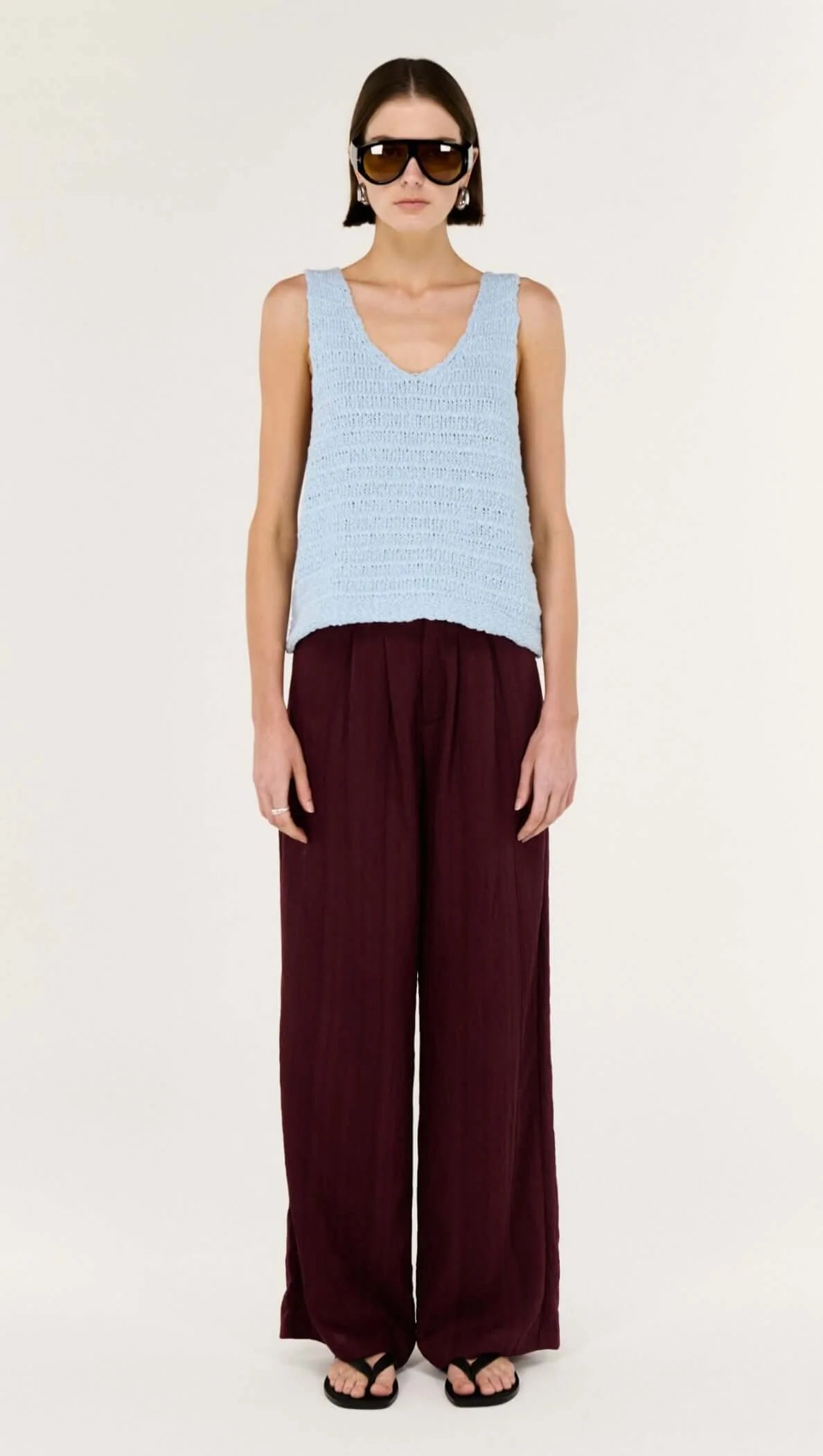 Effortless Layers, Endless Style.

Meet the Indie Baby Blue Cotton Knit Tank from Staple The Label, your new go-to for breezy, modern warm-weather dressing. Crafted in a softly textured knit, this sleeveless tank drapes beautifully over the body with a relaxed silhouette that feels easy yet polished.

