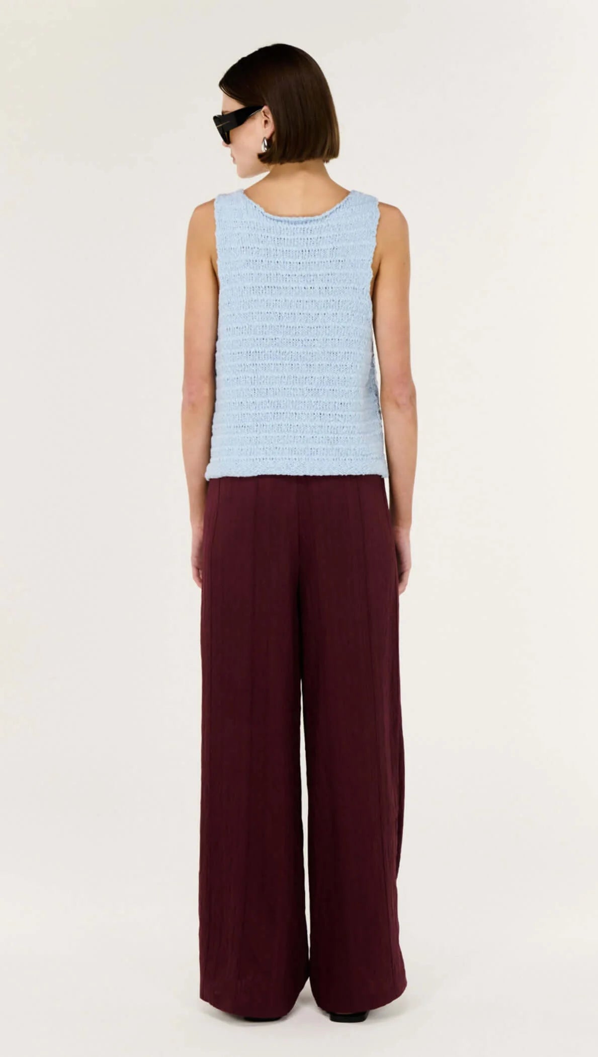 Effortless Layers, Endless Style.

Meet the Indie Baby Blue Cotton Knit Tank from Staple The Label, your new go-to for breezy, modern warm-weather dressing. Crafted in a softly textured knit, this sleeveless tank drapes beautifully over the body with a relaxed silhouette that feels easy yet polished.