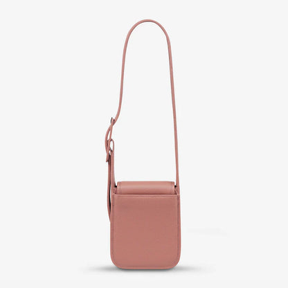 Knowing her mind, 'Perplex' has places to go and people to see. With a more structured body, leather wrapped buckle, back slider pocket for your phone and snap magnet closure, Perplex comfortably hugs your body and is ready for your next day or night adventure.
