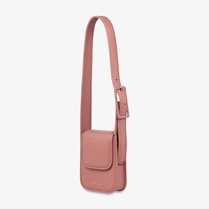 Knowing her mind, 'Perplex' has places to go and people to see. With a more structured body, leather wrapped buckle, back slider pocket for your phone and snap magnet closure, Perplex comfortably hugs your body and is ready for your next day or night adventure.