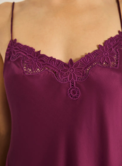 Meet the Kit Cami—an effortlessly elegant piece crafted with a soft V neckline, adjustable straps, and intricate embroidered detailing. Designed to drape beautifully with a luxurious hand feel, it brings a touch of timeless sophistication to any outfit. Pair with shorts or a floaty skirt for an ensemble that works from day to night.