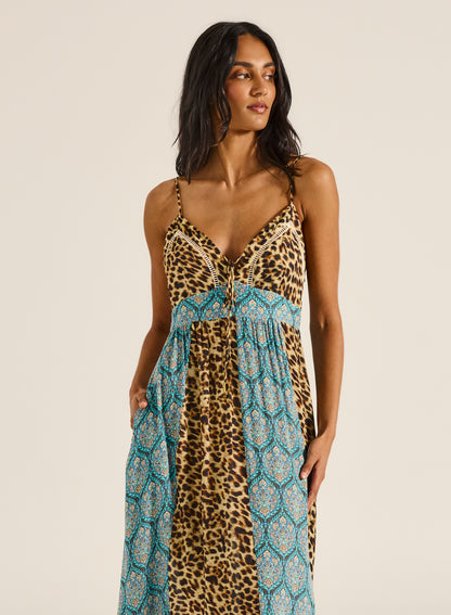 Turn heads from beach to bar in a maxi that’s pure wild energy.

Meet the Tigerlily Jungle Teja Maxi Dress, where bold prints and breezy elegance come together in one seriously standout piece. With its striking blend of leopard spots and intricate teal patterns, this dress channels effortless wanderlust and a free-spirited, bohemian vibe. It’s the kind of piece you throw on for a sunny brunch or sunset drinks and instantly feel put-together (with minimal effort, we love that).
