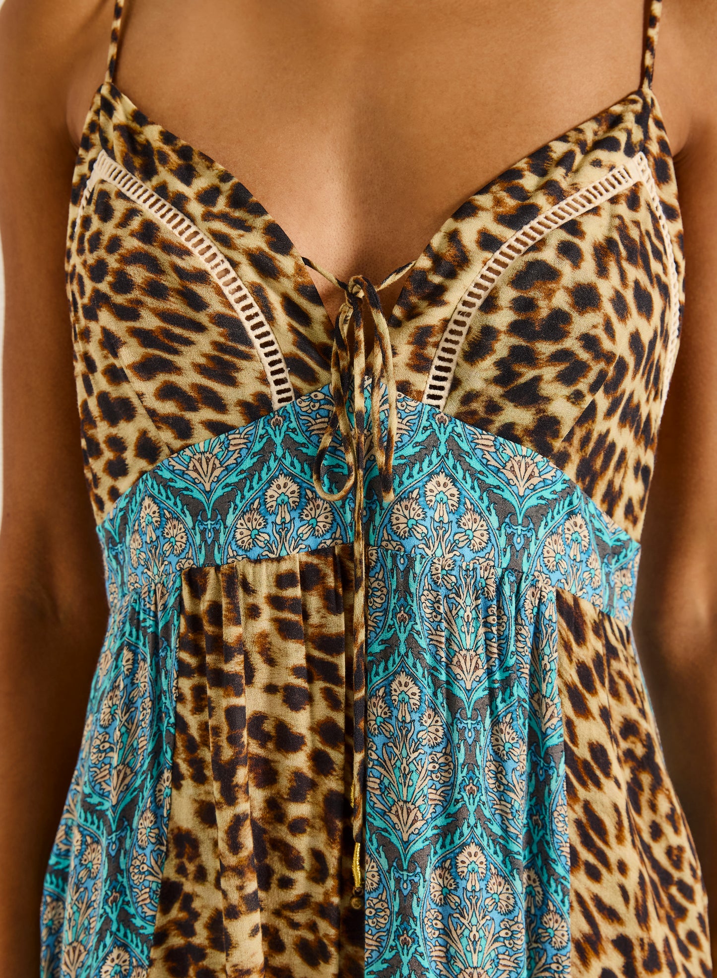 Turn heads from beach to bar in a maxi that’s pure wild energy.

Meet the Tigerlily Jungle Teja Maxi Dress, where bold prints and breezy elegance come together in one seriously standout piece. With its striking blend of leopard spots and intricate teal patterns, this dress channels effortless wanderlust and a free-spirited, bohemian vibe. It’s the kind of piece you throw on for a sunny brunch or sunset drinks and instantly feel put-together (with minimal effort, we love that).