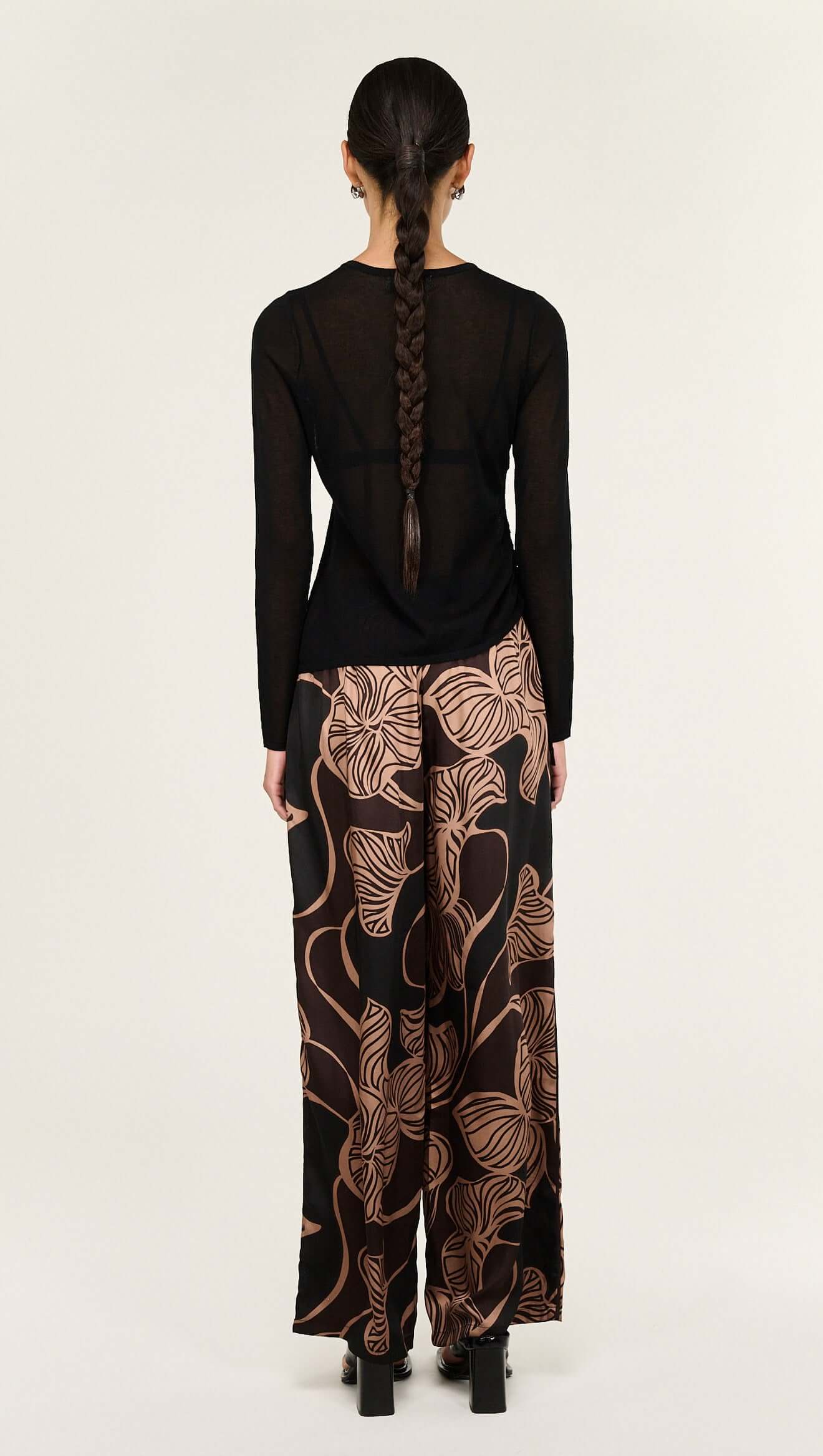 The Abstract Leaf Print Relaxed Silky Pants are designed for effortless, elevated dressing with a statement edge. 