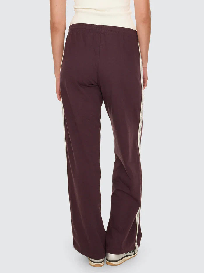 Thrills Off Track Pant

Made for comfort you'll want to wear over and over, the Off Track Pant in Aubergine is an all-around favourite from our winter streetwear Australia collection. Sitting high on the waist, this elevated track pant keeps things clean with pintuck pleats down the leg and webbing tape running along the outer seams for a subtle sport edge. The loop-back cotton feels soft but substantial, while zip pockets, an elastic waist, and an internal drawcord keep it easy to wear. 