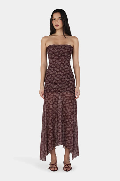 Soft, flirty, and made to move with you. This is your “main character energy” dress.

Meet the Ownley Zella Midi Dress – Daisy Dot Cherry Choc, a strapless silhouette that blends romance and ease in the most effortless way. Designed in a dreamy cherry-chocolate daisy dot mesh, it brings a playful yet elevated vibe that feels perfect for dinners, events, or those nights where you just want to feel a little extra.