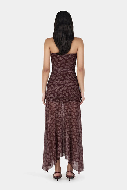 Soft, flirty, and made to move with you. This is your “main character energy” dress.

Meet the Ownley Zella Midi Dress – Daisy Dot Cherry Choc, a strapless silhouette that blends romance and ease in the most effortless way. Designed in a dreamy cherry-chocolate daisy dot mesh, it brings a playful yet elevated vibe that feels perfect for dinners, events, or those nights where you just want to feel a little extra.
