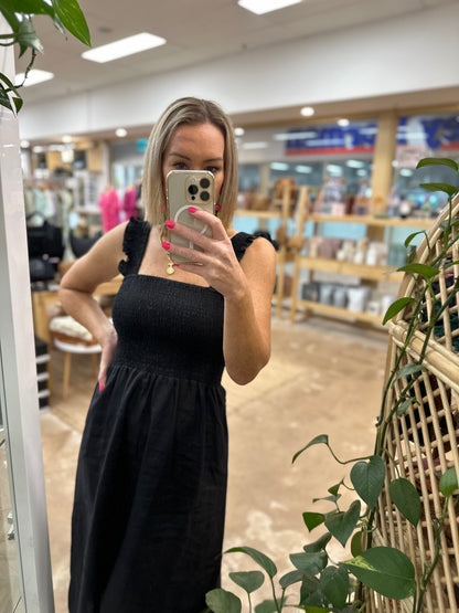 Goldie Dress by pops + Co is the perfect little black dress. Can be dressed up or down for any occasion. 100% linen, midi length, sheered bodest with thrill sleeve.