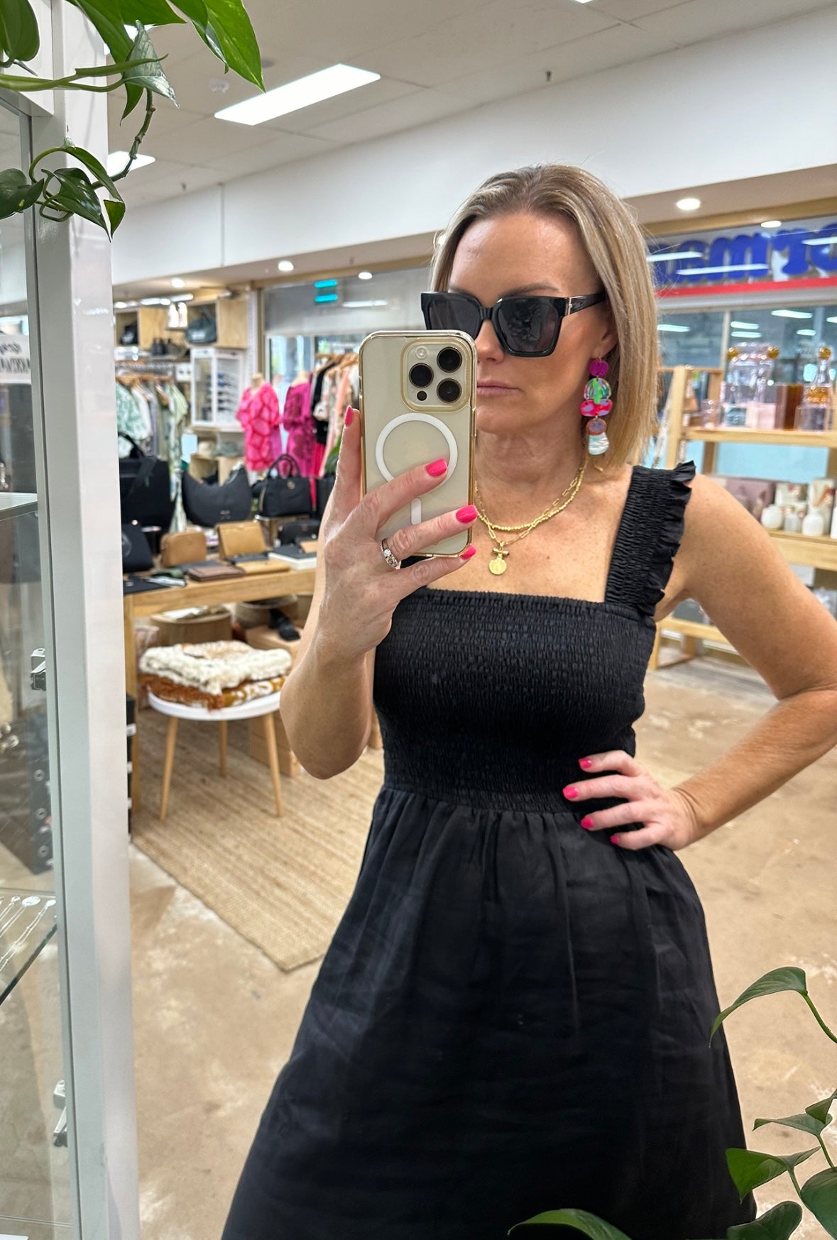 Goldie Dress by pops + Co is the perfect little black dress. Can be dressed up or down for any occasion. 100% linen, midi length, sheered bodest with thrill sleeve.