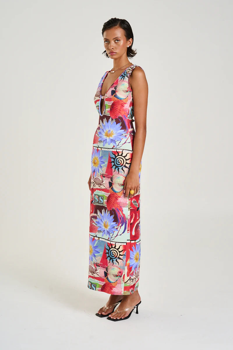 The Miami Maxi Dress in the distinctive Dazed print offers an elegant design with a deep v-neck and a keyhole detail secured by a clasp.&nbsp;Designed to flatter and highlight your figure, this dress accentuates the feminine form to achieve a flawless silhouette.