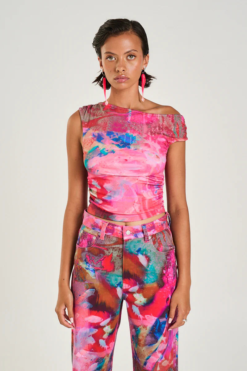 Make Waves in Style with the Off Shoulder Tank

Turn heads effortlessly in Summi Summi’s Off Shoulder Tank, featuring the bold and playful Fish Tank print. Crafted from a soft, stretchy rayon blend, this tank hugs in all the right places with a ruched midsection for a flattering silhouette that moves with you.
