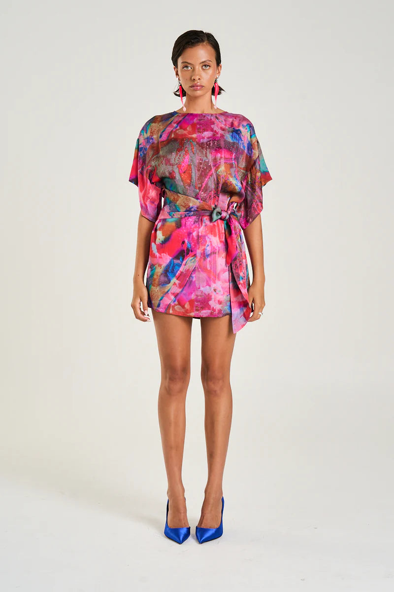 Meet your new “wear it once and get compliments all day” dress.

The Summi Summi Tie Front Dress – Fish Tank Print is playful, flattering, and just the right amount of bold. With its eye-catching Fish Tank print and modern mini silhouette, it brings instant personality to your wardrobe while still keeping things effortlessly wearable.