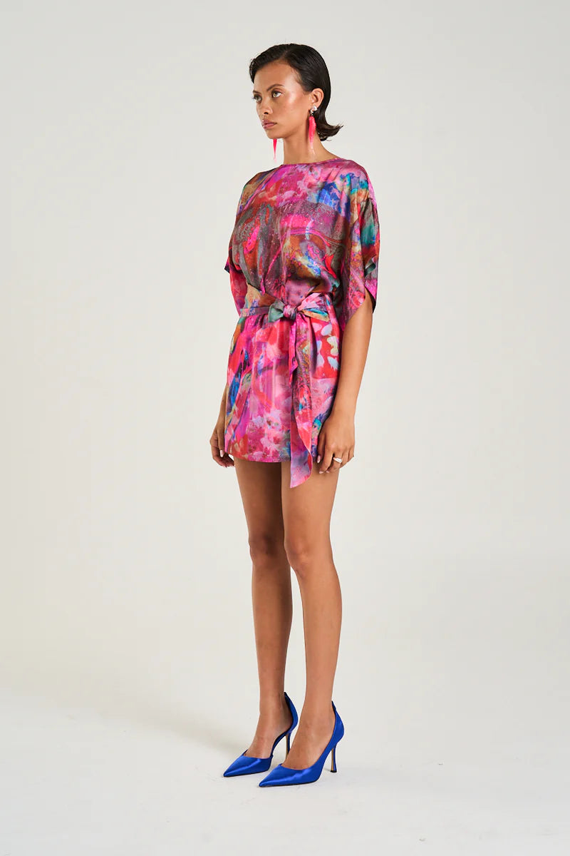 Meet your new “wear it once and get compliments all day” dress.

The Summi Summi Tie Front Dress – Fish Tank Print is playful, flattering, and just the right amount of bold. With its eye-catching Fish Tank print and modern mini silhouette, it brings instant personality to your wardrobe while still keeping things effortlessly wearable.