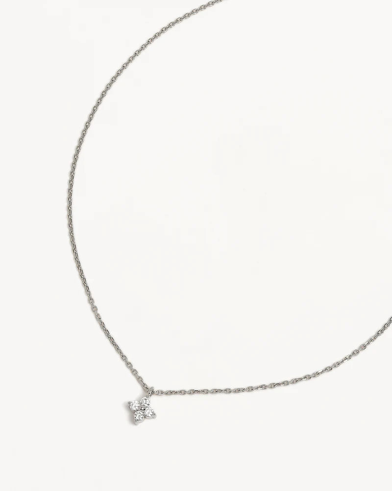 A graceful homage to the lotus, our&nbsp;Crystal Bloom&nbsp;Necklace&nbsp;radiates&nbsp;strength and beauty, symbolising your journey through challenges to&nbsp;emerge&nbsp;stronger, brighter, and uniquely you. Available in 18k gold vermeil and&nbsp;925&nbsp;sterling silver.&nbsp;