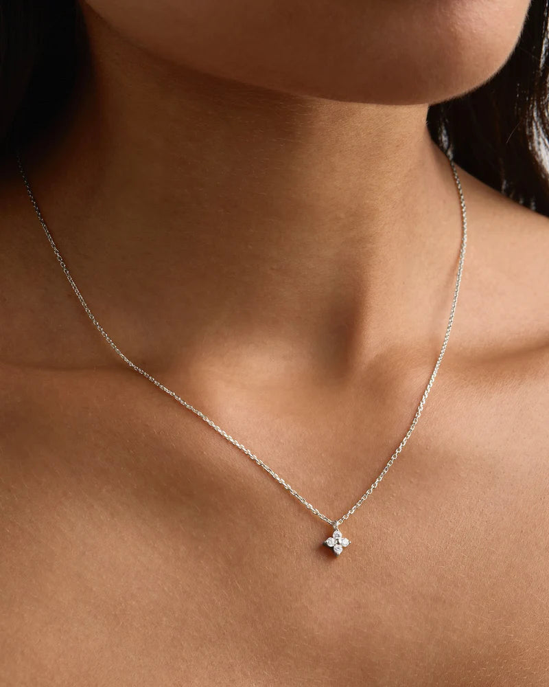 A graceful homage to the lotus, our&nbsp;Crystal Bloom&nbsp;Necklace&nbsp;radiates&nbsp;strength and beauty, symbolising your journey through challenges to&nbsp;emerge&nbsp;stronger, brighter, and uniquely you. Available in 18k gold vermeil and&nbsp;925&nbsp;sterling silver.&nbsp;