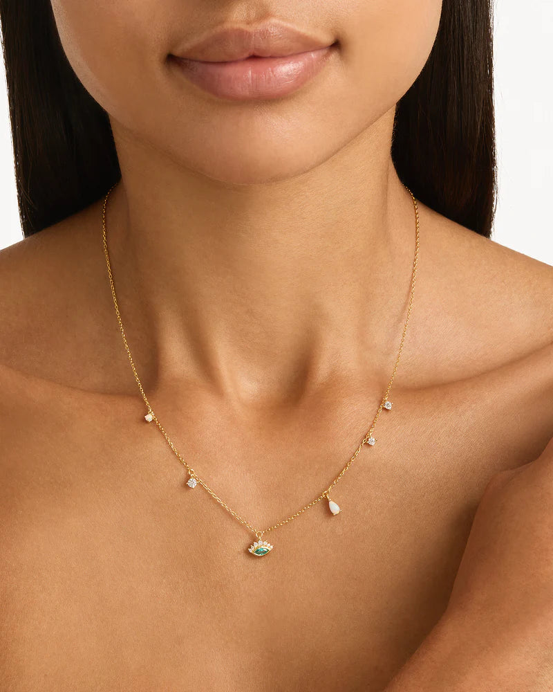 Breathe new life into the new year&nbsp;with the&nbsp;Hope and Protection&nbsp;Necklace.&nbsp;Set with&nbsp;lab-grown&nbsp;opals and&nbsp;lab-grown blue Paraiba marquise-cut gemstone,&nbsp;our luminous evil&nbsp;eye&nbsp;will&nbsp;assist&nbsp;you in shedding all that does not serve you, allowing you to move into the new year with purpose and peace.&nbsp;This keepsake is perfect for gifting,&nbsp;traditionally gifted to imbue the wearer with luck and protection.&nbsp;