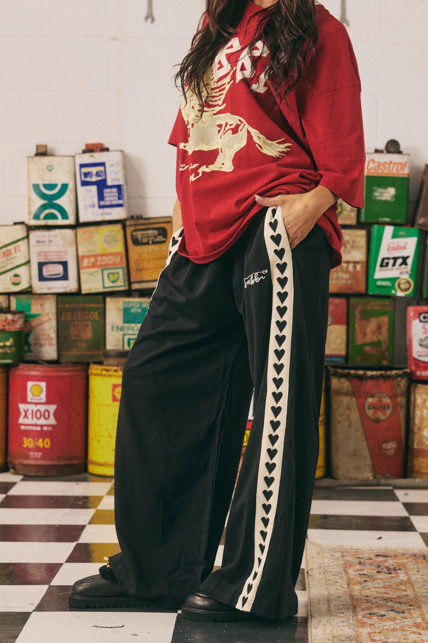 The Raving Hearts Pants

The raving heart pants are the ultimate head nod to living your best 90's life!

Featuring an extra wide relaxed leg, woven heart tape down side legs, side pockets, a cute Sabbi leg embroidery and thick elasticated waistband with draw string.

Set hearts racing in these bad boys.