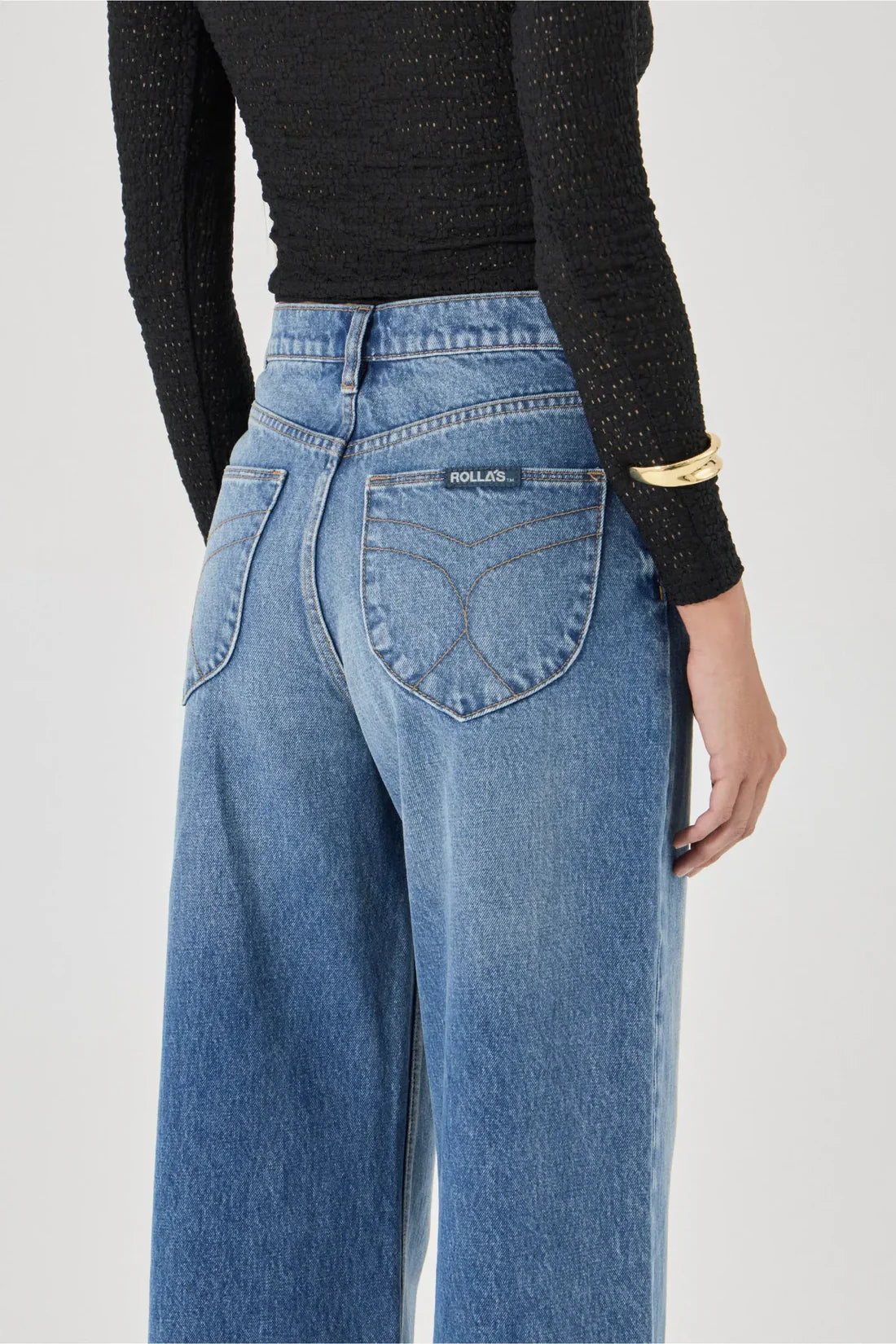 The Relaxed Sailor is a high-rise fit featuring a relaxed, A-line wide leg. Designed to sit loose and off the body, this long-length silhouette is finished with front scoop pockets and our signature spade back pockets with deck stitching