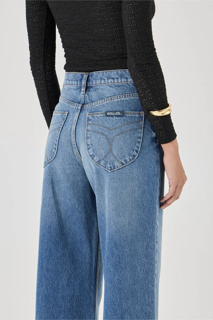 The Relaxed Sailor is a high-rise fit featuring a relaxed, A-line wide leg. Designed to sit loose and off the body, this long-length silhouette is finished with front scoop pockets and our signature spade back pockets with deck stitching
