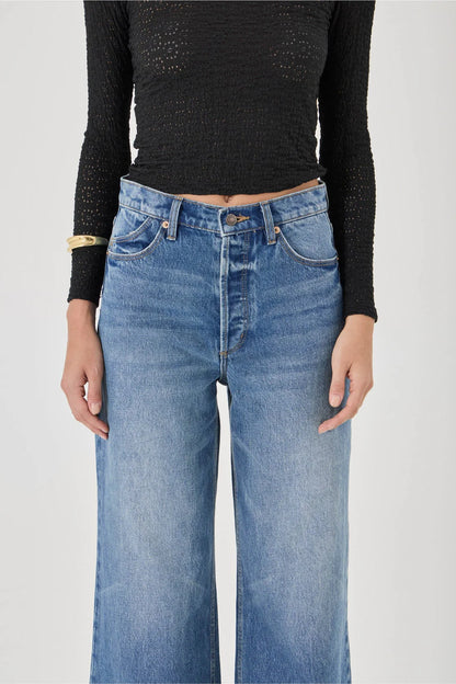 The Relaxed Sailor is a high-rise fit featuring a relaxed, A-line wide leg. Designed to sit loose and off the body, this long-length silhouette is finished with front scoop pockets and our signature spade back pockets with deck stitching